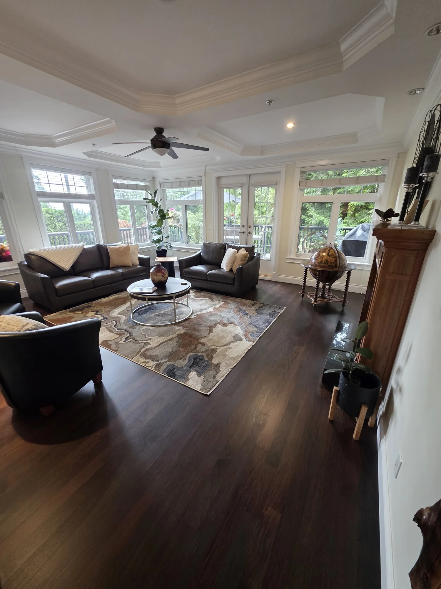 Rich dark hardwood in a furnished living room