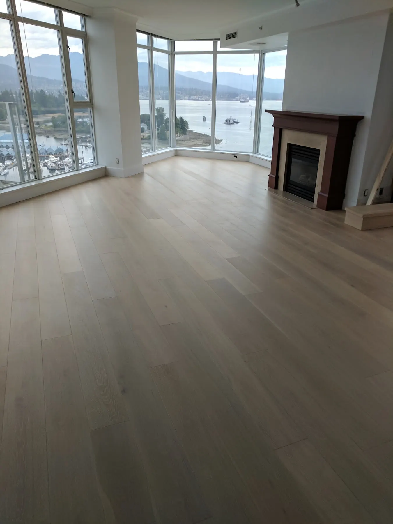 The completed hardwood floor before the furniture returned.