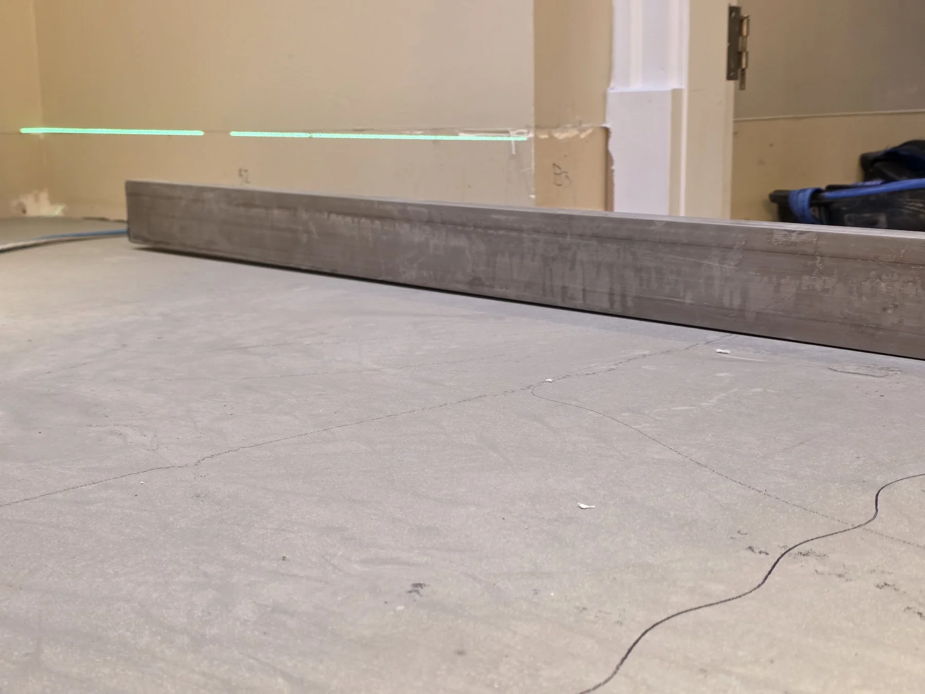 Subfloor assessment at Westport using a laser and straightedge